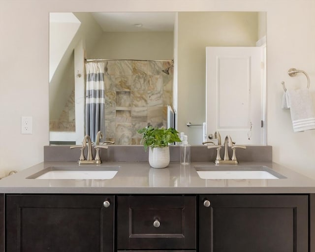 bathroom with a shower with shower curtain and vanity