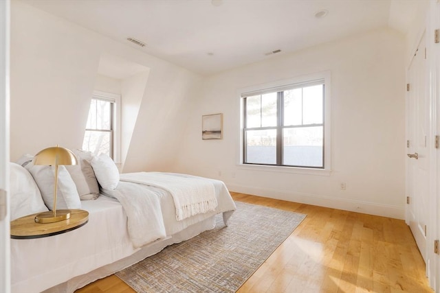 bedroom featuring light hardwood / wood-style floors