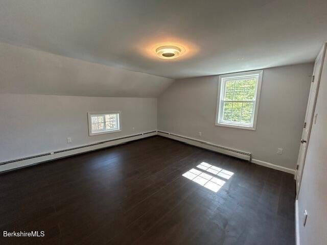 15 Murray Ave, North Adams, MA 01247 - bonus room featuring lofted ceiling, dark wood-style floors, baseboards, and a baseboard radiator