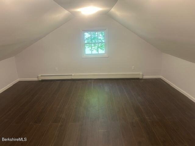 15 Murray Ave, North Adams, MA 01247 - bonus room with baseboards, dark wood-style flooring, vaulted ceiling, and a baseboard heating unit