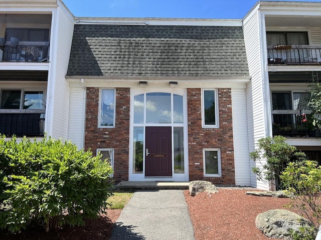 96 Main St Unit C8, Foxboro, MA 02035 - townhome / multi-family property featuring a shingled roof and brick siding