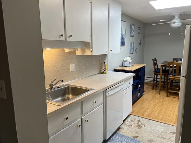 96 Main St Unit C8, Foxboro, MA 02035 - kitchen featuring white appliances, light countertops, a ceiling fan, and tasteful backsplash