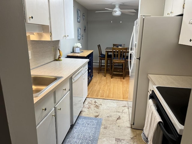96 Main St Unit C8, Foxboro, MA 02035 - kitchen featuring dishwasher, ceiling fan, black electric range oven, light countertops, and white cabinetry