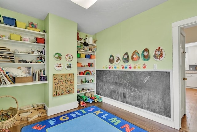 game room featuring wood finished floors