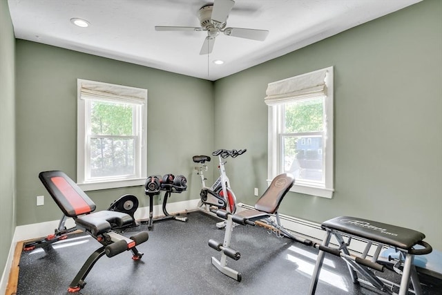 exercise room featuring plenty of natural light, baseboards, a ceiling fan, and recessed lighting