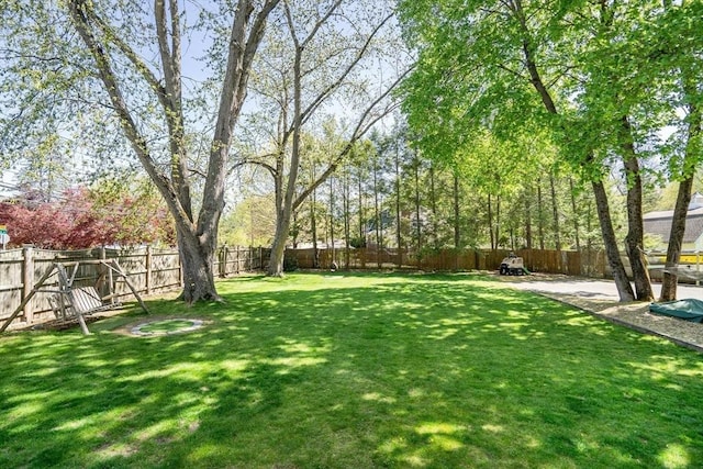 view of yard with a fenced backyard