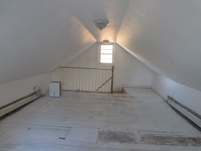 bonus room with vaulted ceiling