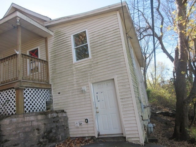 rear view of house with a balcony