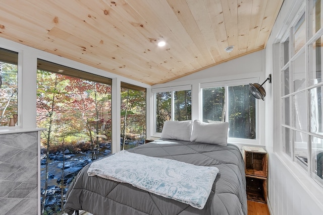 bedroom with wooden ceiling, vaulted ceiling, and hardwood / wood-style flooring