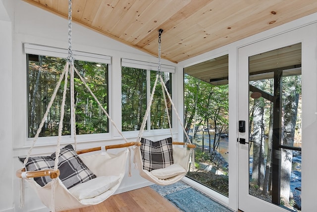 sunroom / solarium with wooden ceiling and vaulted ceiling