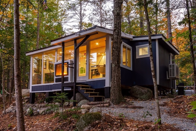 exterior space with a sunroom