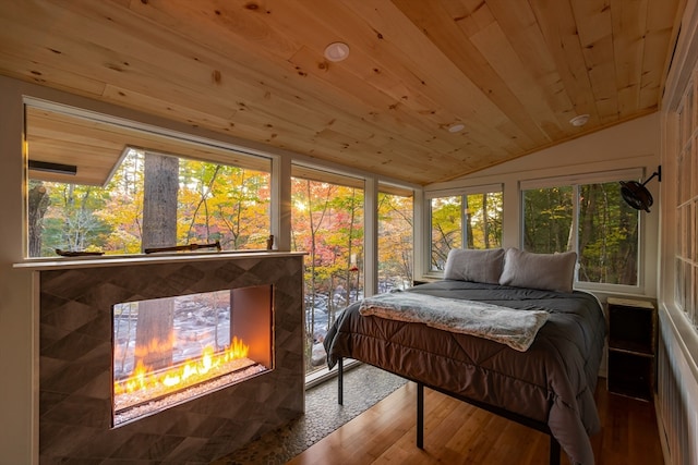 sunroom / solarium with wooden ceiling and lofted ceiling