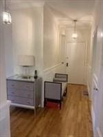 hallway featuring wood finished floors
