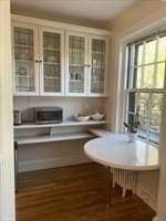 dining area with wood finished floors