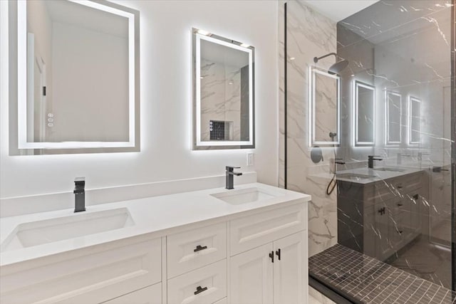 157 Princeton St Unit 1, Boston, MA 02128 - bathroom featuring a marble finish shower and double vanity