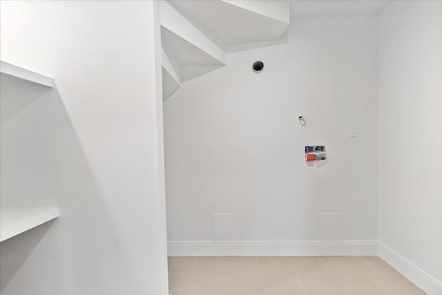 157 Princeton St Unit 1, Boston, MA 02128 - laundry area featuring baseboards and light tile patterned floors