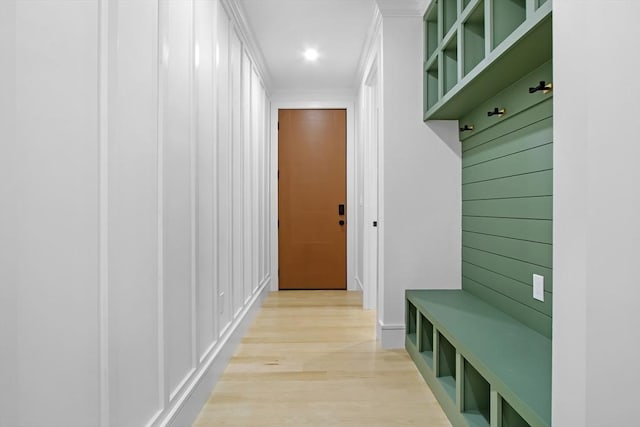 293 Cross St, Norwell, MA 02061 - mudroom with light wood-style flooring and crown molding