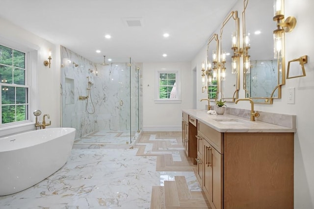 293 Cross St, Norwell, MA 02061 - full bath featuring a marble finish shower, a soaking tub, double vanity, and recessed lighting