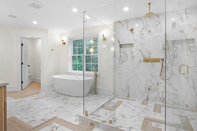 293 Cross St, Norwell, MA 02061 - bathroom with a marble finish shower, a freestanding tub, vanity, recessed lighting, and marble tiled floors