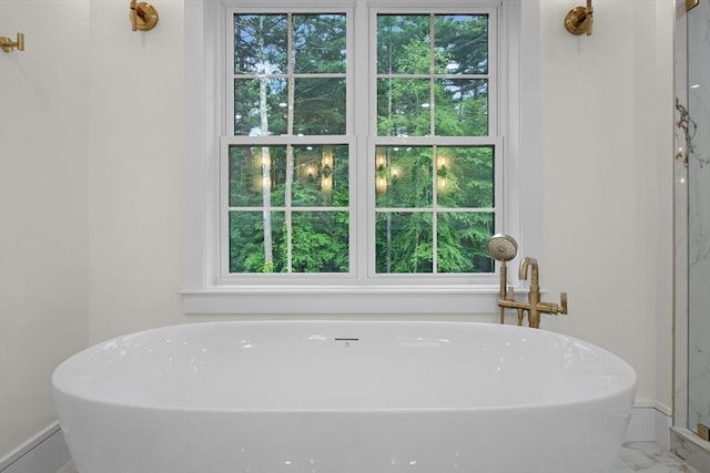 293 Cross St, Norwell, MA 02061 - bathroom featuring a soaking tub and marble finish flooring