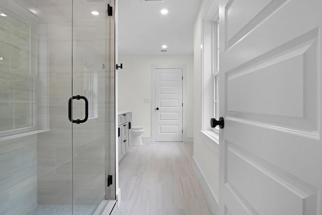 293 Cross St, Norwell, MA 02061 - full bathroom with a shower stall, recessed lighting, vanity, and wood finished floors