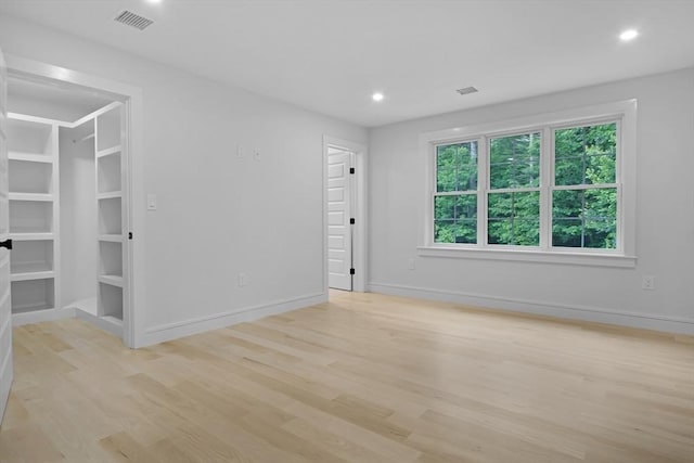 293 Cross St, Norwell, MA 02061 - empty room with light wood-style flooring and recessed lighting