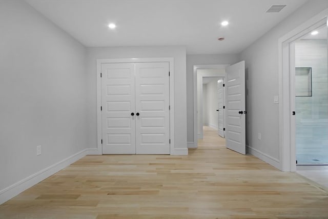 293 Cross St, Norwell, MA 02061 - unfurnished bedroom featuring recessed lighting, light wood finished floors, a closet, and ensuite bathroom