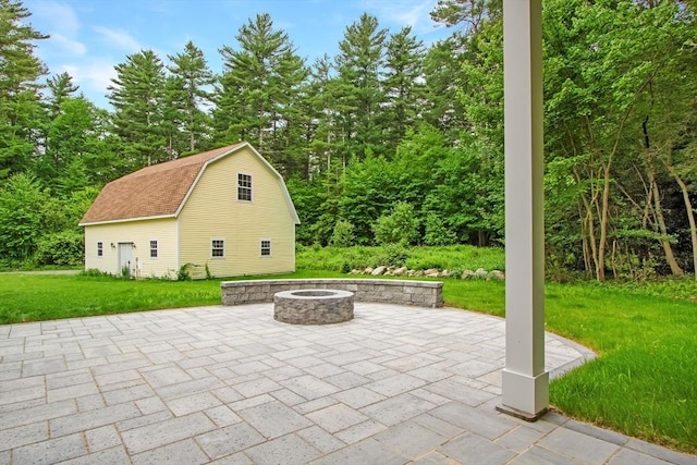 293 Cross St, Norwell, MA 02061 - view of patio featuring an outdoor fire pit and an outdoor structure