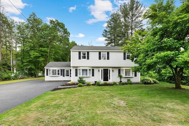 186 Andover St, North Andover, MA 01845 - colonial-style house featuring asphalt driveway and a front lawn