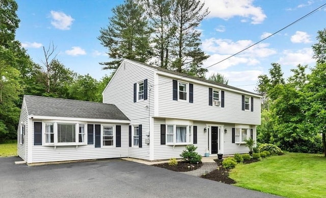 186 Andover St, North Andover, MA 01845 - colonial inspired home with a front lawn and driveway