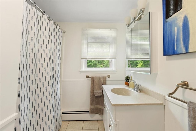 186 Andover St, North Andover, MA 01845 - full bathroom with a baseboard heating unit, vanity, tile patterned flooring, and a shower with shower curtain