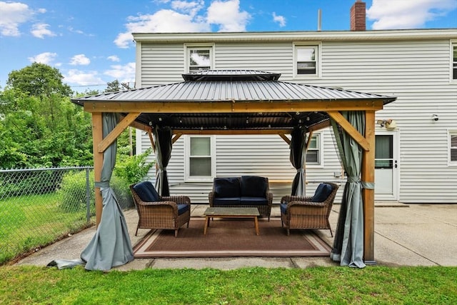 186 Andover St, North Andover, MA 01845 - back of house with a gazebo, an outdoor hangout area, a patio, a chimney, and a metal roof
