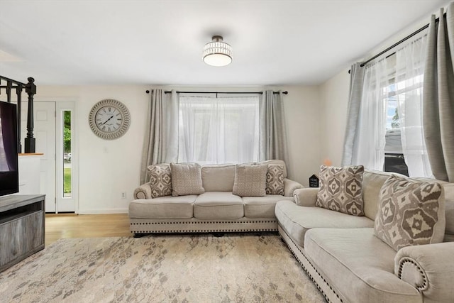 186 Andover St, North Andover, MA 01845 - living area featuring light wood finished floors and baseboards