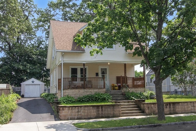 103 Monrovia St, Springfield, MA 01104 - view of front of home featuring an outdoor structure, a porch, asphalt driveway, stairway, and roof with shingles