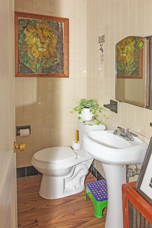 103 Monrovia St, Springfield, MA 01104 - bathroom featuring tile walls, tasteful backsplash, and wood finished floors