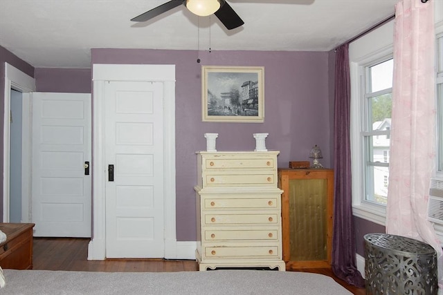 103 Monrovia St, Springfield, MA 01104 - bedroom with wood finished floors, multiple windows, and a ceiling fan