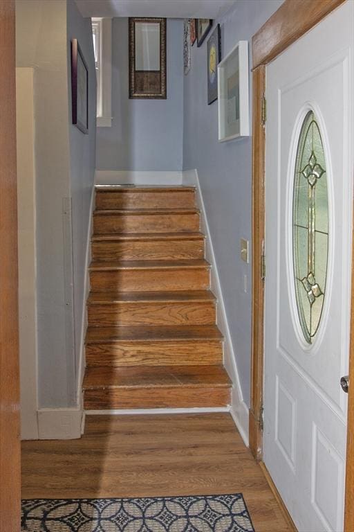 103 Monrovia St, Springfield, MA 01104 - staircase with wood finished floors and baseboards