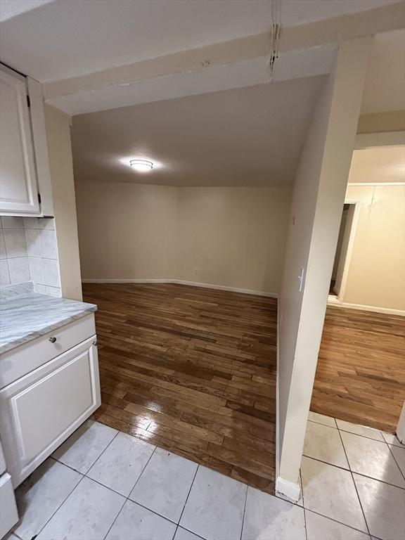 interior space featuring light tile patterned flooring