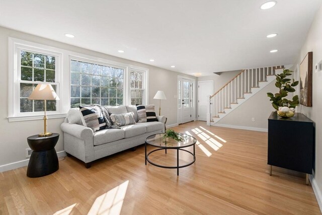 110 Westover Pkwy, Norwood, MA 02062 - living room with light wood-type flooring, baseboards, recessed lighting, and stairs