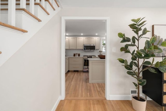 110 Westover Pkwy, Norwood, MA 02062 - hall featuring recessed lighting, light wood-type flooring, visible vents, and baseboards