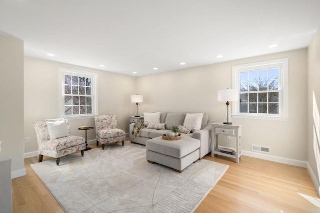 110 Westover Pkwy, Norwood, MA 02062 - living area featuring recessed lighting, light wood-style floors, visible vents, and baseboards