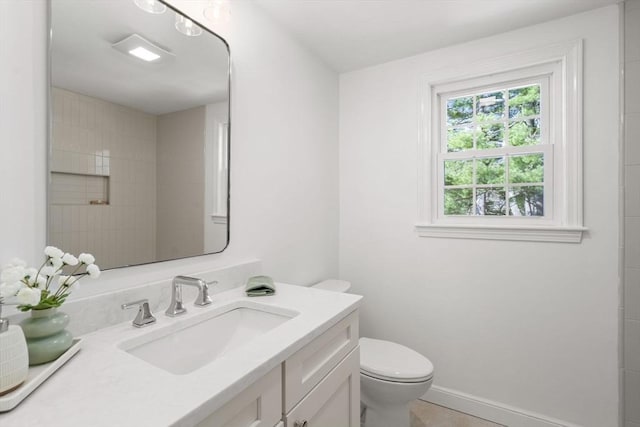 110 Westover Pkwy, Norwood, MA 02062 - bathroom featuring baseboards, vanity, and toilet