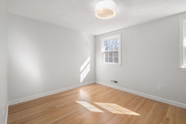 110 Westover Pkwy, Norwood, MA 02062 - spare room featuring light wood finished floors, baseboards, and visible vents