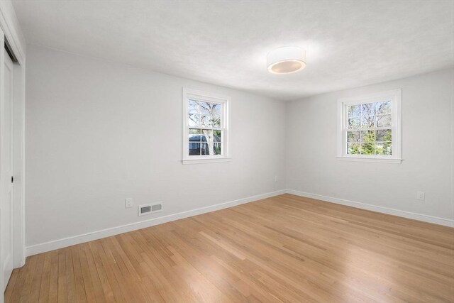 110 Westover Pkwy, Norwood, MA 02062 - spare room featuring light wood-style flooring, visible vents, and baseboards