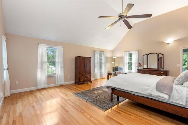 495 Grafton St, Shrewsbury, MA 01545 - bedroom with high vaulted ceiling, light wood-type flooring, multiple windows, and baseboards