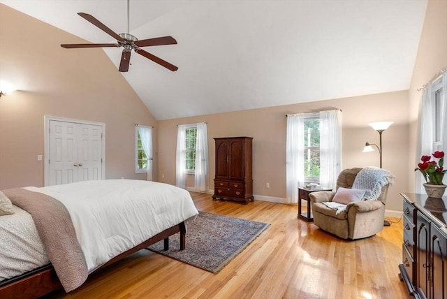495 Grafton St, Shrewsbury, MA 01545 - bedroom with high vaulted ceiling, light wood finished floors, multiple windows, and baseboards