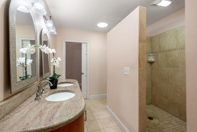 495 Grafton St, Shrewsbury, MA 01545 - bathroom with a sink, walk in shower, tile patterned floors, double vanity, and baseboards