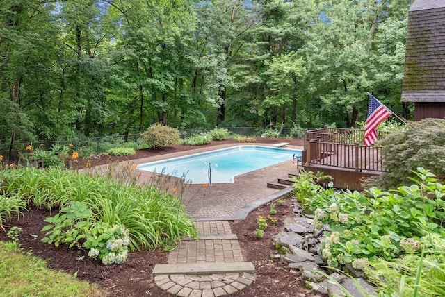 495 Grafton St, Shrewsbury, MA 01545 - view of pool featuring a deck, fence, a fenced in pool, and a diving board