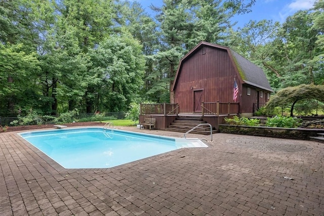 495 Grafton St, Shrewsbury, MA 01545 - outdoor pool with a patio area, a barn, and an outbuilding