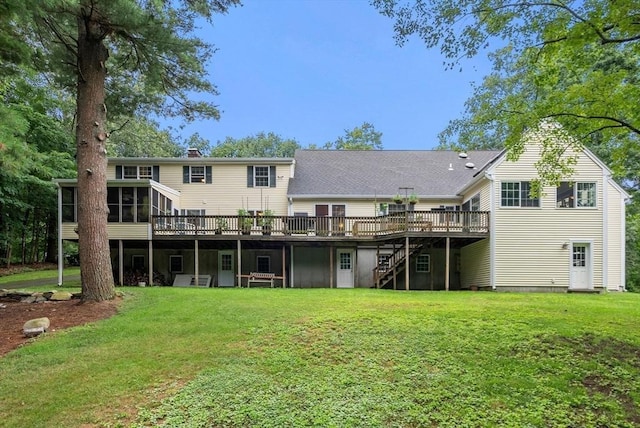 495 Grafton St, Shrewsbury, MA 01545 - rear view of property with a yard, stairway, a sunroom, and a wooden deck